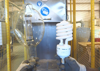 A picture of a large compact fluorescent bulb and high pressure sodium light. NLR recycles fluorescent tubes and light bulbs of all shapes and sizes.